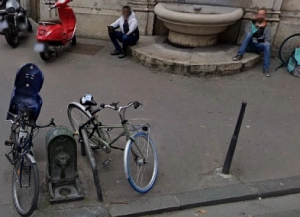 At 29 Rue de la Fromagerie, on the sidewalk just below the Lyon fountain